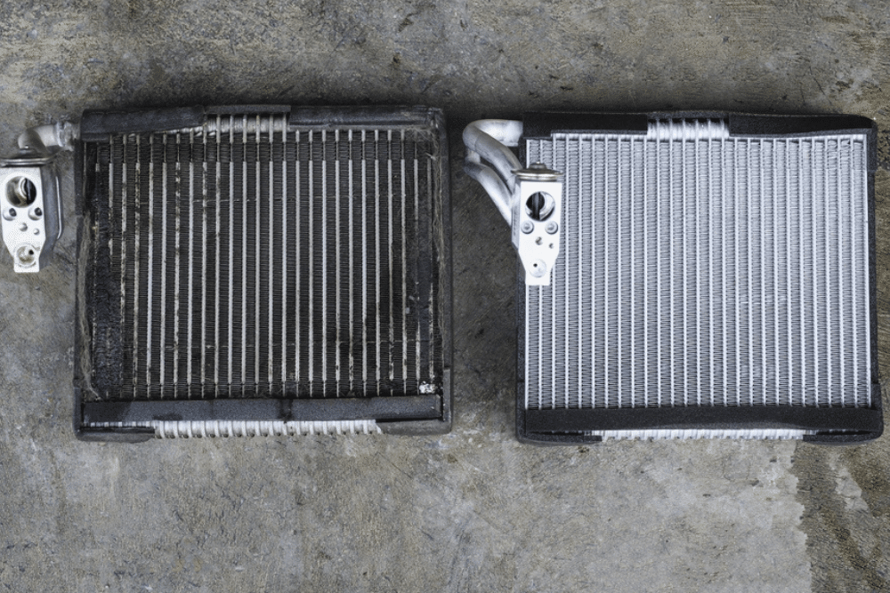 AC Evaporator Replacement in Lonsdale, MN by Lonsdale Auto Works: A side-by-side comparison of a dirty and a clean AC evaporator core, emphasizing the importance of maintaining and replacing this essential component for optimal vehicle air conditioning performance.