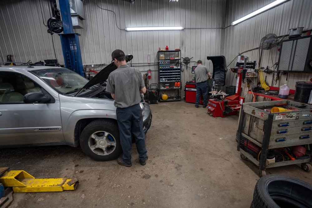 Pre-Purchase Car Inspection in Lonsdale MN At Lonsdale Auto Works. Two mechanics performing a pre-purchase vehicle inspection in Auto repair shop